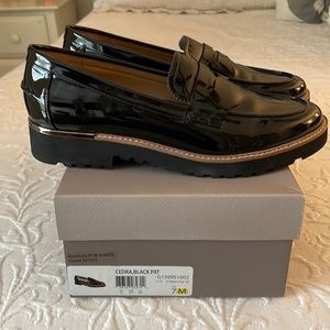 Frank’s Sarto Cedra black patent loafer. 7M